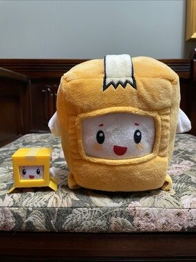 Lanky Box Boxy plush and plastic figure.